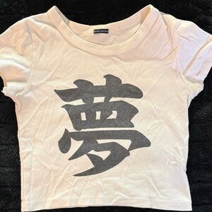 Brandy Melville Cream Crop Top with Black Graphic